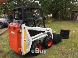 Bobcat 443 skid steer loader with bucket grab spare wheels and tyres