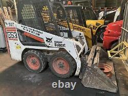 Bobcat 553 skid steer loader and Indespension trailer