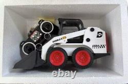 Remote control operated toy skid steer