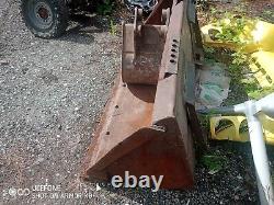 2003 New Holland skid steer high lift pour charger les camions-bennes