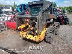 2003 New Holland skid steer high lift pour charger les camions-bennes