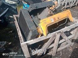 2003 New Holland skid steer high lift pour charger les camions-bennes