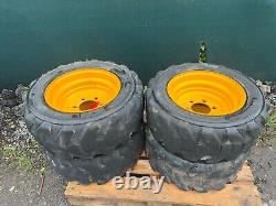 Jante et pneu JCB 10-16.5 £200 + TVA Chargeuse à pneus Skidsteer solideal T27