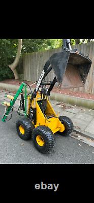 Opico MX10 skidster Skidsteer

  <br/> 
<br/>  Translation: Opico MX10 skidster Skidsteer